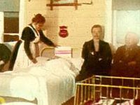 Hospital staff tending patients