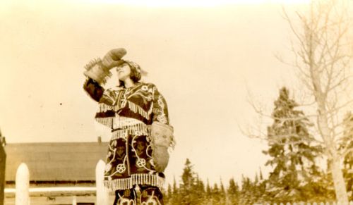 inuit woman dressed in traditional clothing