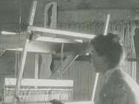 Young woman at loom