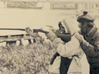 Hannah shooting her gun