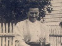 woman by fence