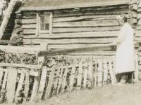 woman next to garden