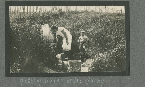 retrieving water fromt he spring