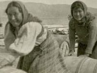 women rolling barrells