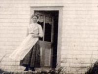 woman standing in doorway