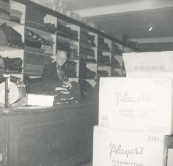 Alfred Hussey, longtime employee, in the dry-goods department, Fishermen's Union Trading Company store.