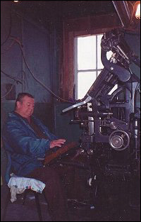 Arthur Sweetland at the linotype machine.