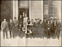 <em>Advocat Staff. —Standing in doorway (left to right)
