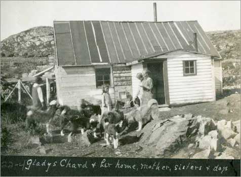 Gladys Chard and her home, mother, sisters, & dogs, Aillik (Labrador), 1930