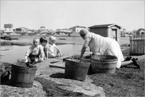 Margaret Janes Scrubbing a Mat, Badger's Quay, 1939