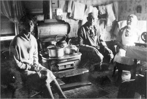 Adults around Kitchen Stove, Pools Island, Bonavista Bay, 1939