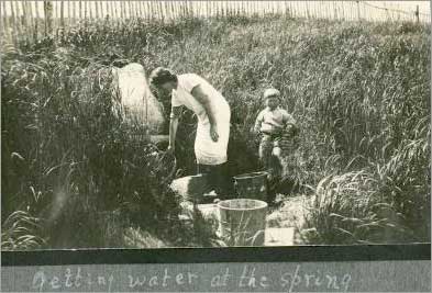 Getting water at the spring, Red Bay, Labrador, 1932