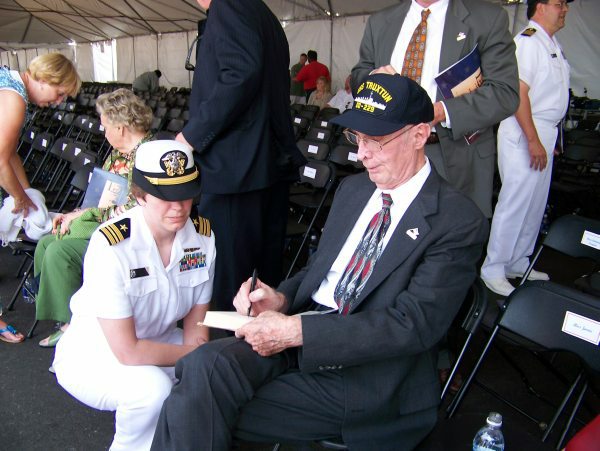 Edward Lewis signing an autograph, 2007