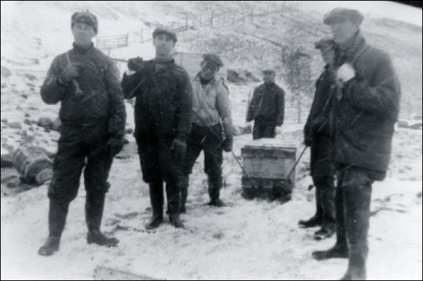 Hauling a casket, February 1942