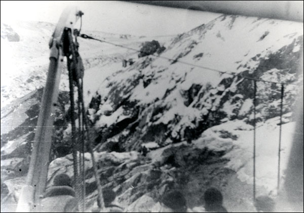 Pollux Sailors Clustered beneath the Boat Falls, February 18, 1942