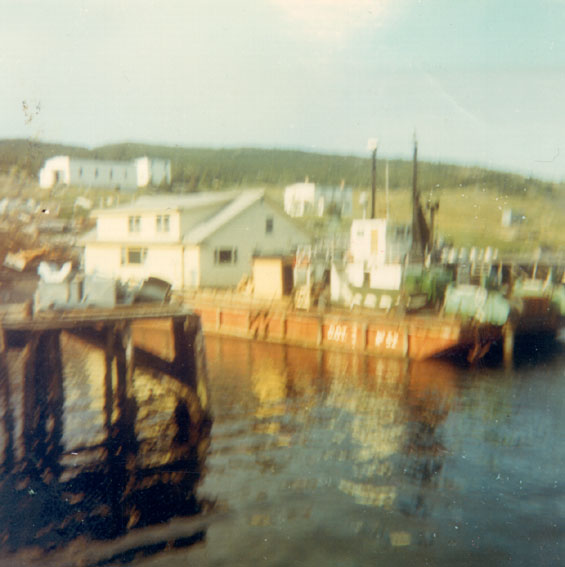 Leeland and Elsie Wareham's house on the barge at Harbour Buffett  ready  to move to Arnold's Cove, Placentia Bay.