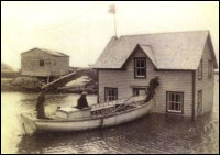 Cape Island, house of Walt Andrews, floating house across Inner Tickle of Newtown after being purchased in Newtown,  1952