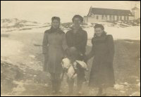 Ida Pomroy (left), Joe Hann (centre) and Minnie Pittman, holding turrs at Merasheen