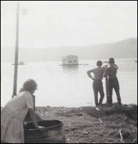 Floating Mike and Hilda Symmonds house from NE Crouse to Conche